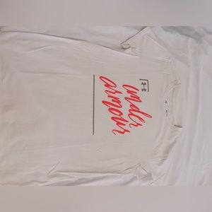 Under Armour T-shirt with logo on front in hot pink